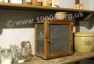 Indoor food safe standing on a shekf, also known as a meat-safe, used where there was no fridge, common up to the mid-1900s