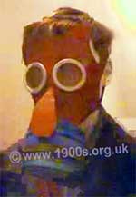 World War Two Mickey Mouse child's gas mask (respirator) worn on a model