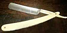 'Open' man's shaving razor: a very sharp blade which folded inside a handle.