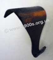 Specially shaped picture hook to support a picture and to hang over a picture rail - typical in early and mid 20th century Britain