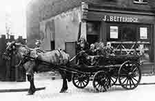 English rag and bone cart outside the rag and bone premises, 1930s