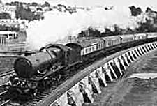 Dirty, sooty steam from the engine of a steam train.