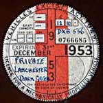 1953 British car-tax disc for a dark green Lanchester family car, thubnail