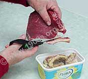 Making off-cuts for dripping by cutting excess fat of braising steak