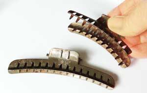 Old hair clamps for holding hair in place as it dried, suitable for Marcel waving