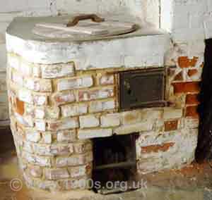 Original built-in 'copper' water heater in the outhouse at Jane Austen's house in Chawton