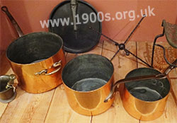 Highly polished copper saucepans