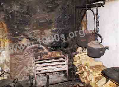 An open fire as used for cooking in labourers' cottages and working class households in the 1700s, 1800s into the early 1900s
