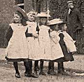 Girls wearing the white pinafores, standard dress, early 1900s