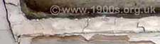 Lower corner of an original sash window showing how 