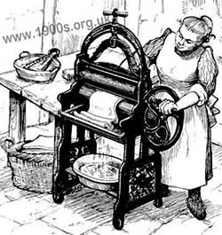 woman using mangle, early 1900s